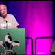 Ben Cohen, co-founder of Ben & Jerry’s, speaks at the company’s annual franchisee meeting in January 2015 in New Orleans. Jerry Greenfield, the company’s other founder, is in the background. Both are wearing the “Hands Up Don’t Shoot” T-shirt they’re urging fanchisees to sell in their shops.
YouTube screenshot